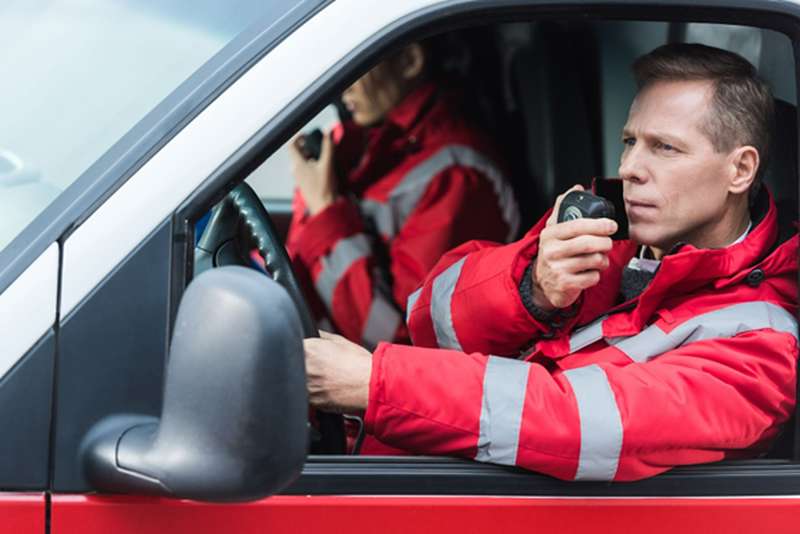 EMT Communicating With Victims Via Phone