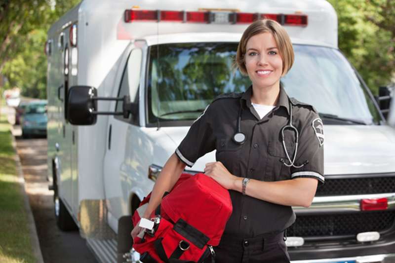 EMT With First Aid Kit Responding Swiftly