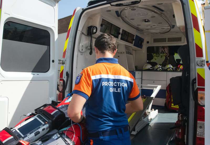 First Aid Worker Attending To A Victim