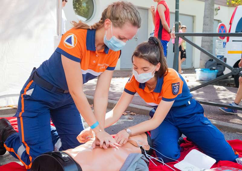 First Aid Workers Performing CPR